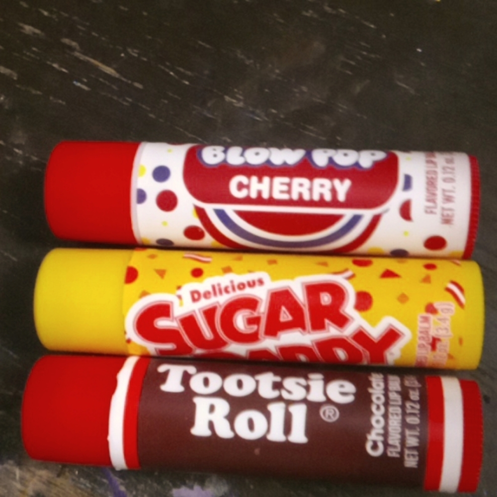3 piece lip balm set , cherry blow pop, sugar daddy, tootise roll $6